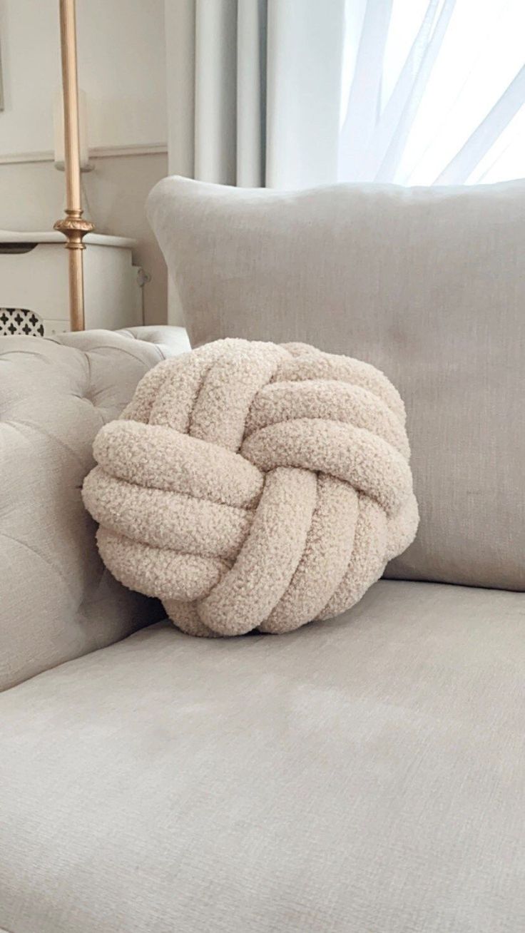 decorative knot beige pillow